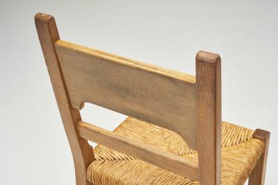 Six Brutalist Dining Chairs with Rush Seats Europe ca 1960s