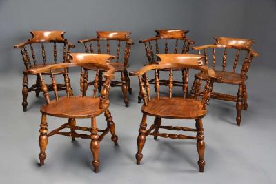 Six mid 19th century smokers bow Windsor or Captain s chairs