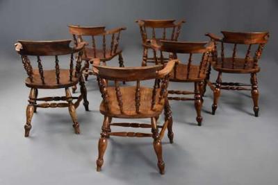 Six mid 19th century smokers bow Windsor or Captain s chairs