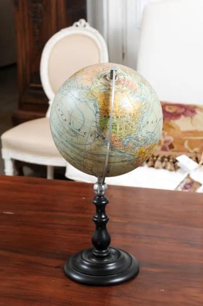 Small French 20th Century Terrestrial Globe on Turned Black Wooden Base