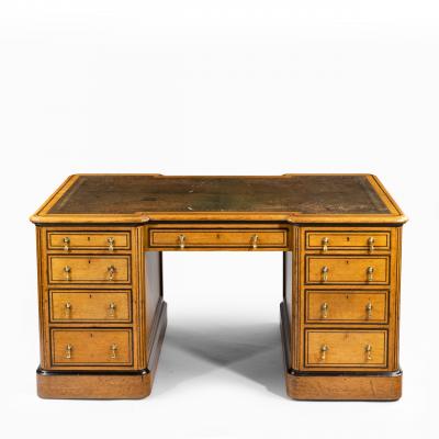 Small Victorian oak and ebony partner s desk attributed to Holland and Son