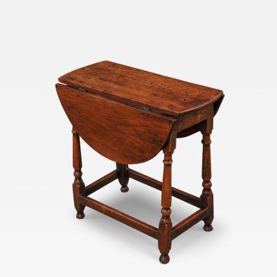 Small and Interesting 18th Century Oak Drop Leaf Table