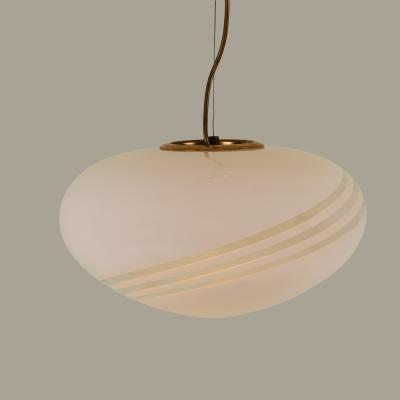 Small oval shaped 1960s Italian white pendant with decorative swirl