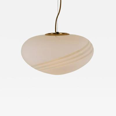 Small oval shaped 1960s Italian white pendant with decorative swirl
