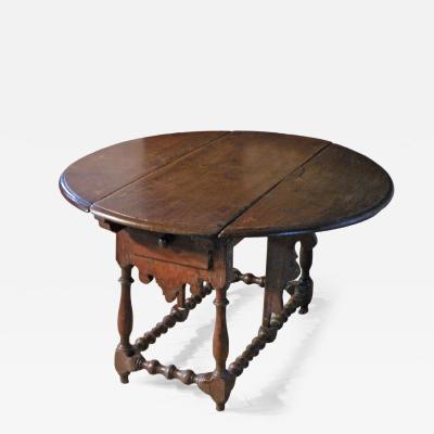 Spanish 17th Century Walnut and inlaid Drop Leaf Table