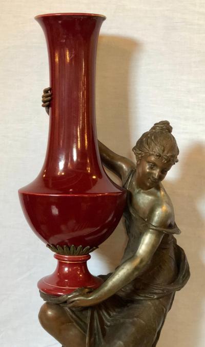 Spelter Figure of a Water Bearer on a Pedestal Marble with Red Glazed Vase