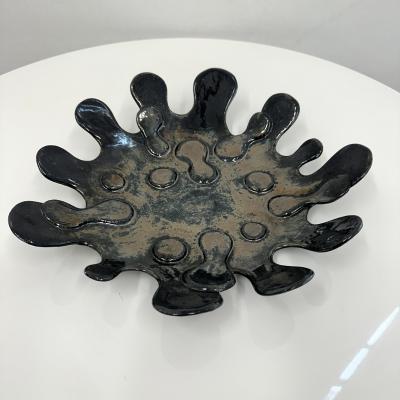 Spudnic Shaped Decorative Bowl in a refective black chrome finish 