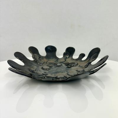 Spudnic Shaped Decorative Bowl in a refective black chrome finish 