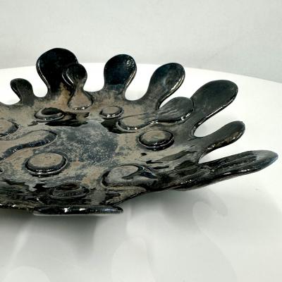 Spudnic Shaped Decorative Bowl in a refective black chrome finish 