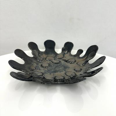 Spudnic Shaped Decorative Bowl in a refective black chrome finish 