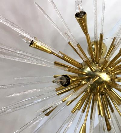 Sputnik chandelier in polished brass and glass Italy 1980