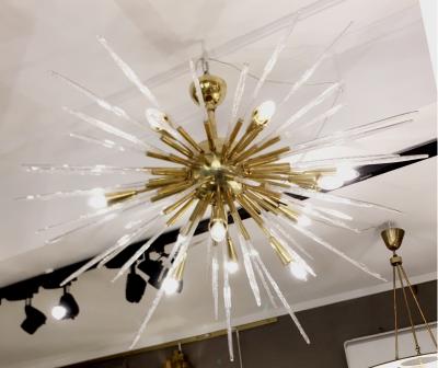 Sputnik chandelier in polished brass and glass Italy 1980