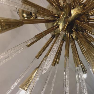 Sputnik chandelier in polished brass and glass Italy 1980