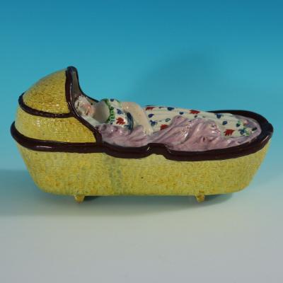 Staffordshire Pearlware Child In Rocking Cradle