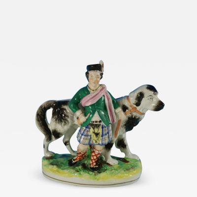 Staffordshire Pottery Boy with St Bernard Figure