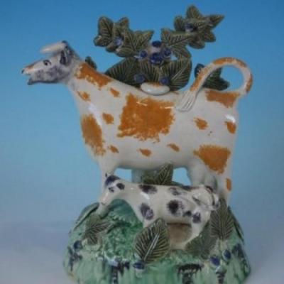 Staffordshire Prattware cow calf creamer with bocage