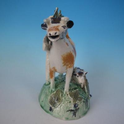 Staffordshire Prattware cow calf creamer with bocage