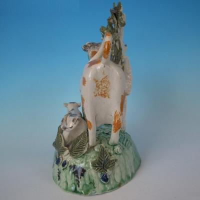 Staffordshire Prattware cow calf creamer with bocage