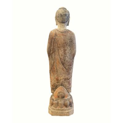 Standing Buddha on lotus pedestal