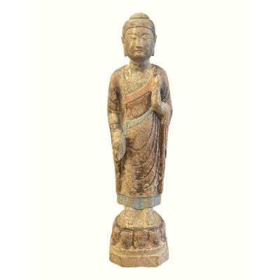 Standing Buddha on lotus pedestal