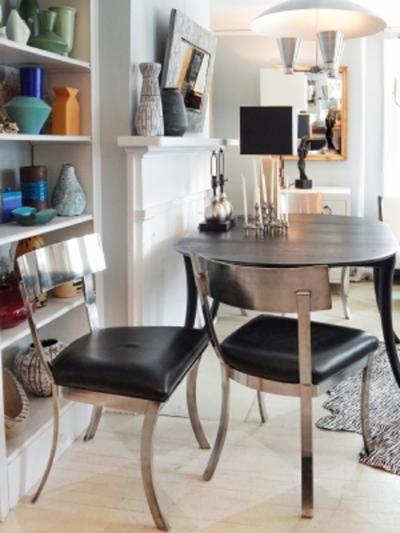 Steel And Black leather Klismos Style chairs