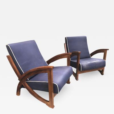 Superb modernist pair of lounge chairs in vintage condition