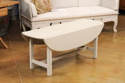 Swedish 1920s Painted Drop Leaf Coffee Table with Oval Top and Stretcher