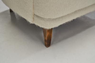 Swedish Cabinetmaker Wingback Chair with Stained Wood Legs Sweden ca 1940s