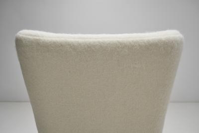 Swedish Cabinetmaker Wingback Chair with Stained Wood Legs Sweden ca 1940s