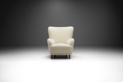 Swedish Cabinetmaker Wingback Chair with Stained Wood Legs Sweden ca 1940s