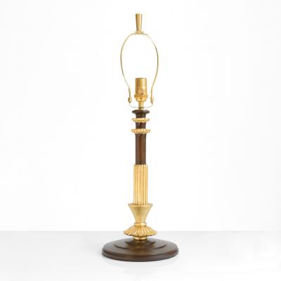 Swedish Grace Art Deco stained wood and gilt table lamp with a column form 