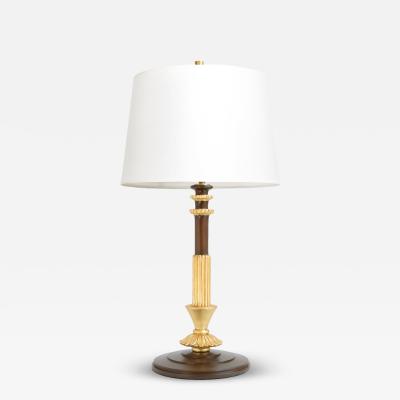 Swedish Grace Art Deco stained wood and gilt table lamp with a column form 