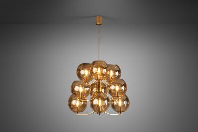Swedish Mid Century Modern Brass 9 armed Chandelier Sweden ca 1960s