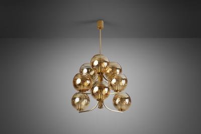 Swedish Mid Century Modern Brass 9 armed Chandelier Sweden ca 1960s