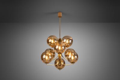 Swedish Mid Century Modern Brass 9 armed Chandelier Sweden ca 1960s