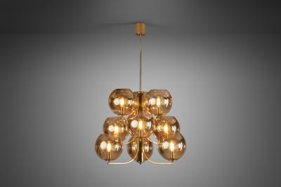Swedish Mid Century Modern Brass 9 armed Chandelier Sweden ca 1960s