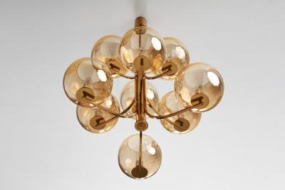 Swedish Mid Century Modern Brass 9 armed Chandelier Sweden ca 1960s
