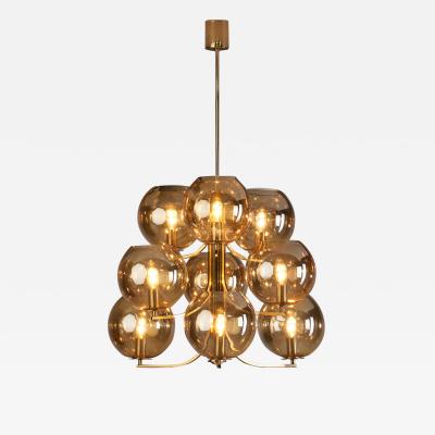 Swedish Mid Century Modern Brass 9 armed Chandelier Sweden ca 1960s