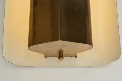Swedish Modern Brass Wall Lamp with a White Lacquered Finish Sweden ca 1940s