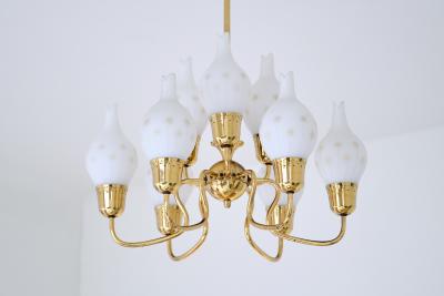 Swedish Modern Nine Arm Chandelier in Brass and Decorated Opal Glass 1950s