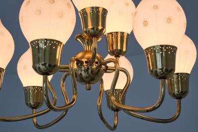 Swedish Modern Nine Arm Chandelier in Brass and Decorated Opal Glass 1950s