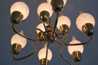 Swedish Modern Nine Arm Chandelier in Brass and Decorated Opal Glass 1950s