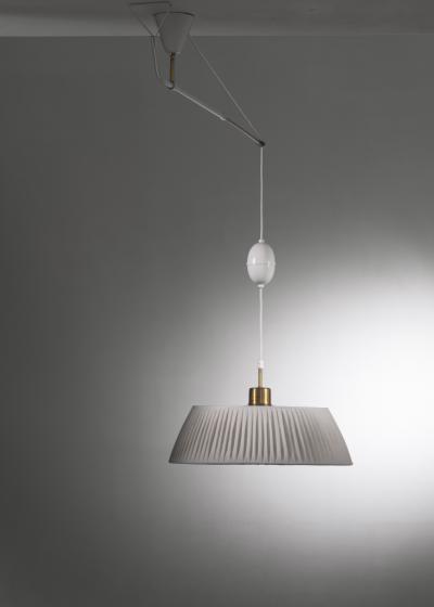 Swiveling and extending ceiling lamp