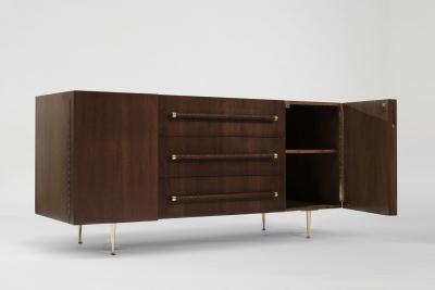 T H Robsjohn Gibbings T H Robsjohn Gibbings Credenza in Walnut and Brass C 1950s