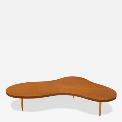 T H Robsjohn Gibbings T H Robsjohn Gibbings Iconic Free Form Coffee Table with Brass Legs 1950s