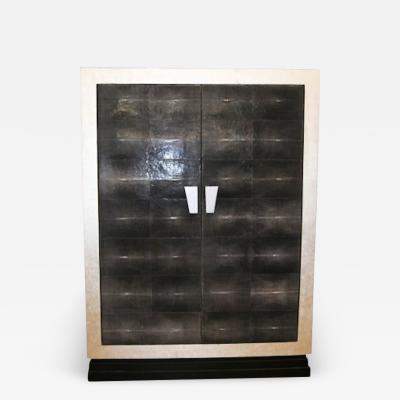 TALL 1940S GALUCHAT AND SILVER LEAF CABINET