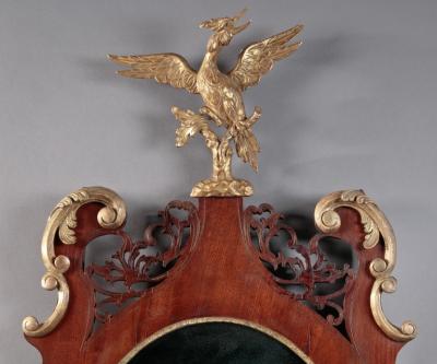 THE HAZZARD FAMILY OVAL CHIPPENDALE LOOKING GLASS