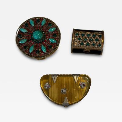 THREE BEJEWELED ART DECO COMPACTS