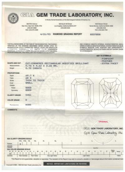 THREE STONE RADIANT WHITE AND YELLOW DIAMOND RING