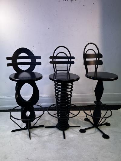 TRIO OF BLACK METAL AND WOOD POST MODERN BAR STOOLS